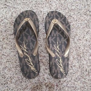 Michael Kors flip flops size 10
